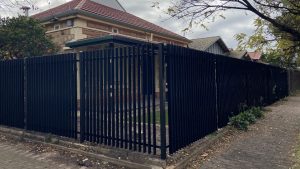 Vertical blade style fencing on corner house adelaide
