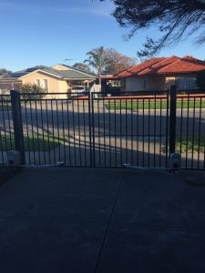 Driveway Gate with Swing Arms by Reliance Fencing Adelaide