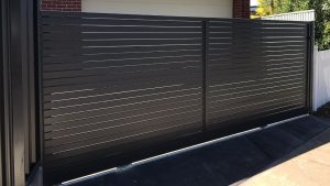 Horizontal aluminum slat sliding gate at Clearview by Reliance Fencing in Adelaide Horizontal aluminum slat sliding gate at Clearview by Reliance Fencing in Adelaide
