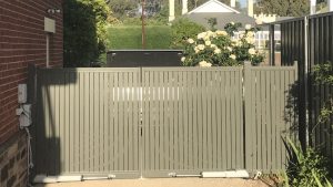 Vertical Slat Driveway gate with automation in Hawthorn by Reliance Fencing Adelaide