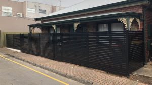 Black horizontal Aluminium at Norwood. Sliding gate completed with FAAC automation.