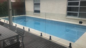 Glass Pool Fencing with Black Spigots