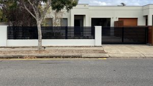 Aluminium slat fence in existing fence pillars Adelaide